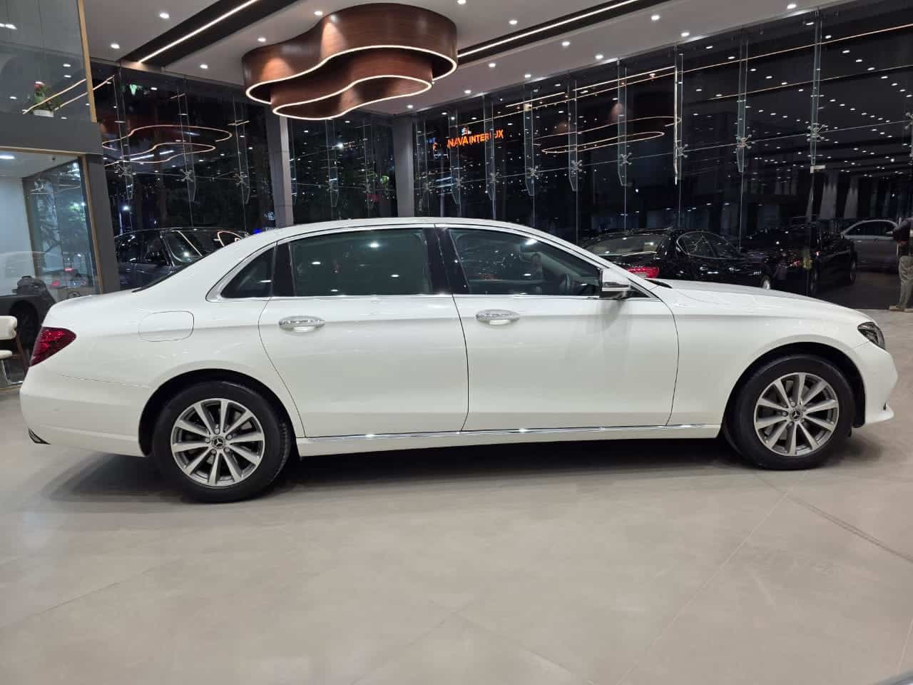 White certified luxury SUV in showroom display
